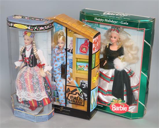 Three Barbie dolls